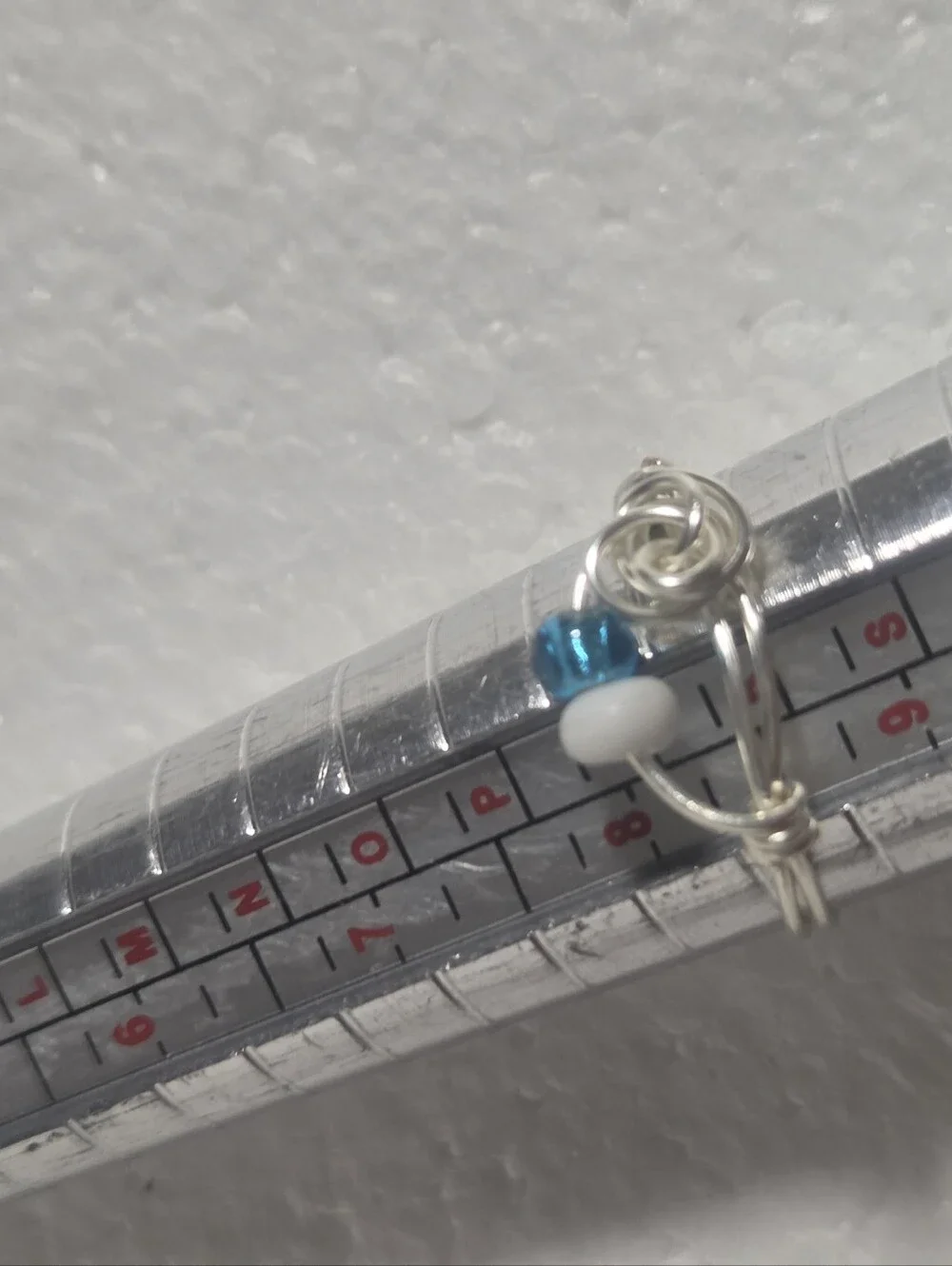 Handcrafted Silver Wire Fidget Ring with Teal and White Beads
